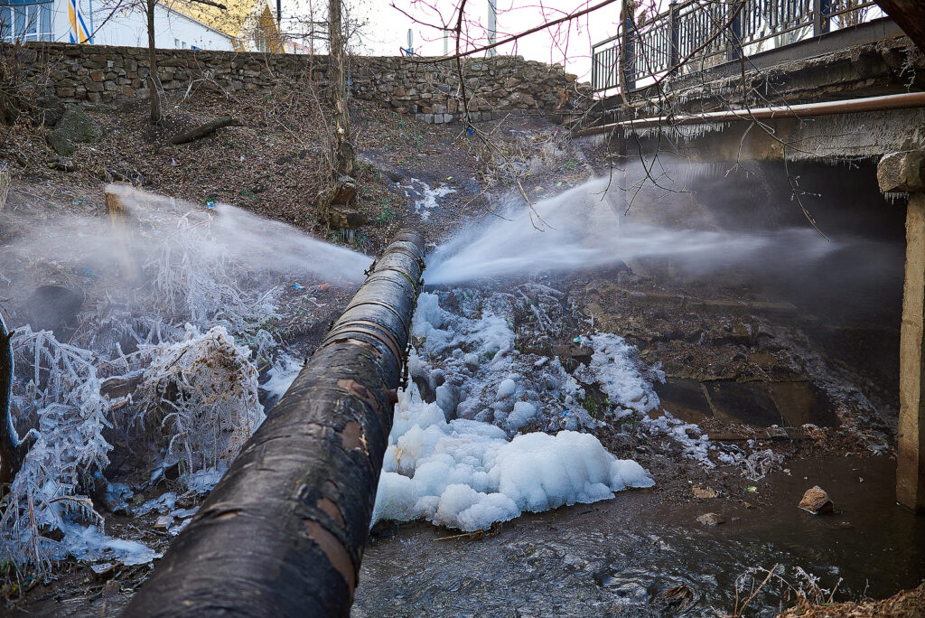 Water Pressure From A Large Pipe Over The River